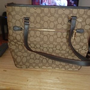 Coach pocket book